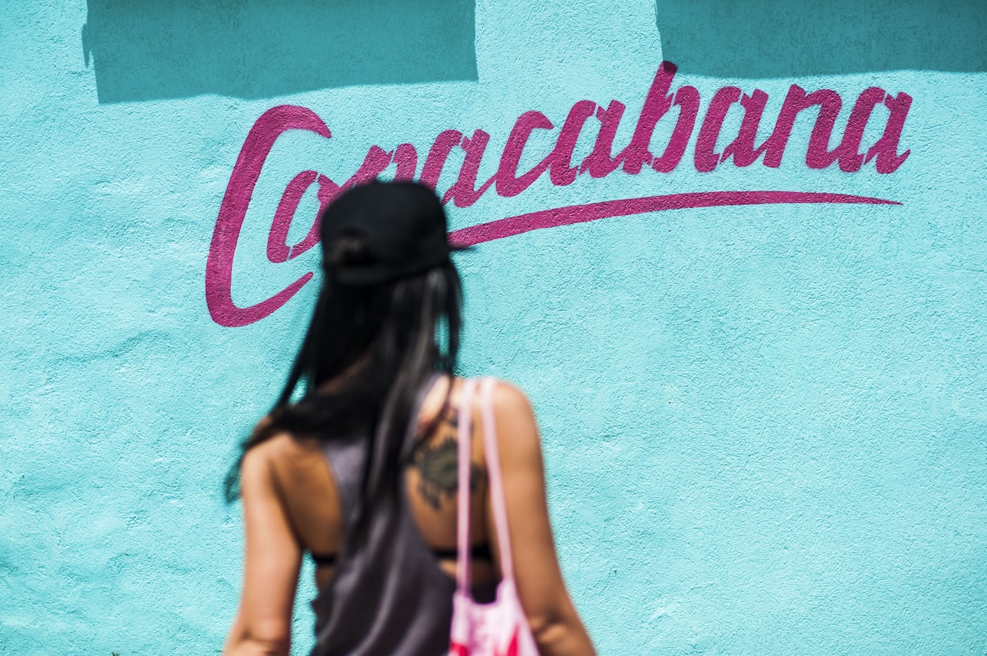 Woman walking in Copacabana, Rio de Janeiro — safety tips for women travelers